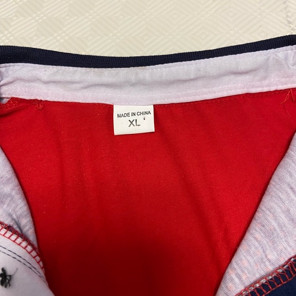 Selling one golf shirt bought online that fits a bit tight for my liking. - Picture 4 of 8